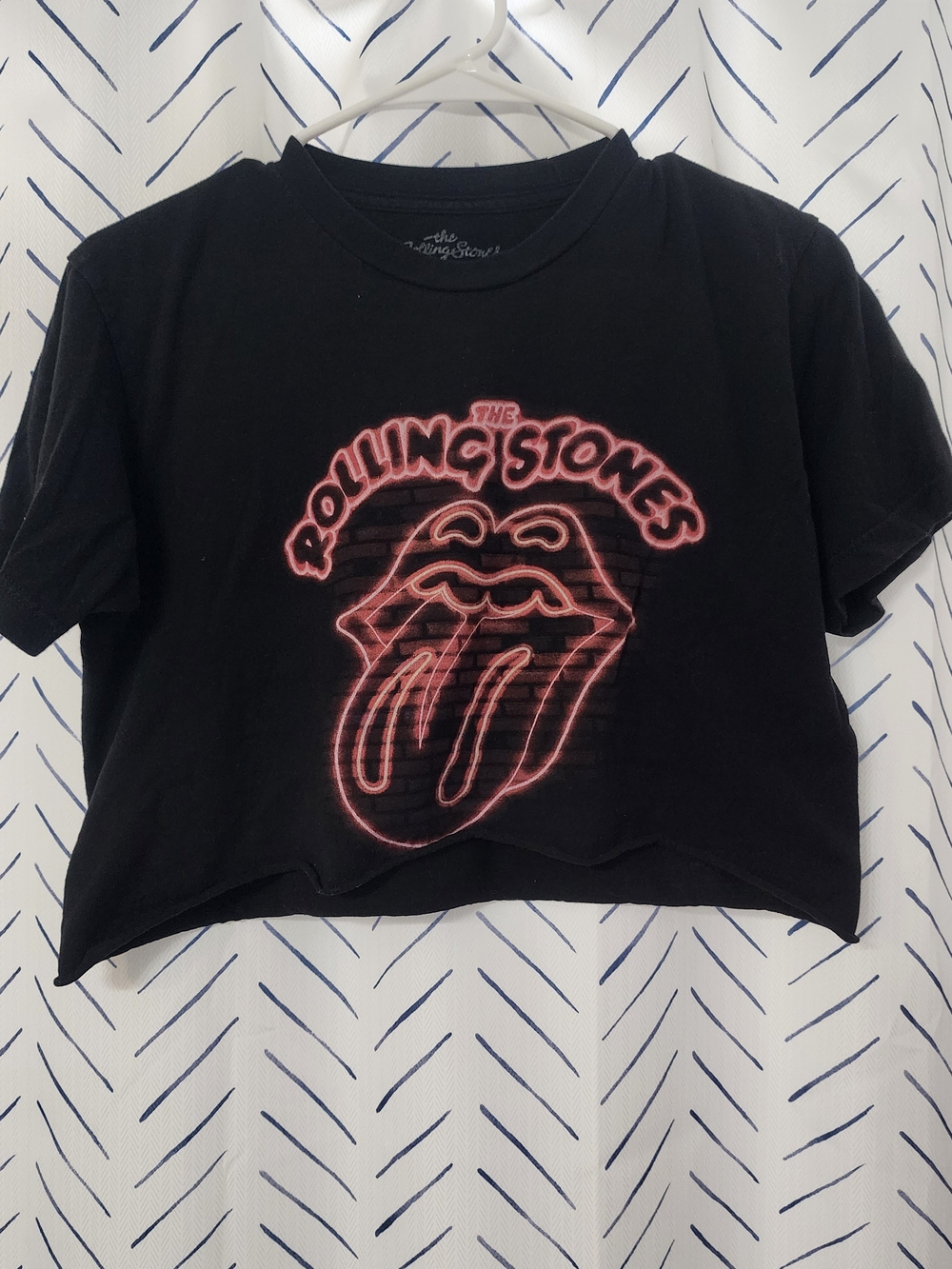 the Rolling Stones Black Crop Tee with Pink Neon Logo